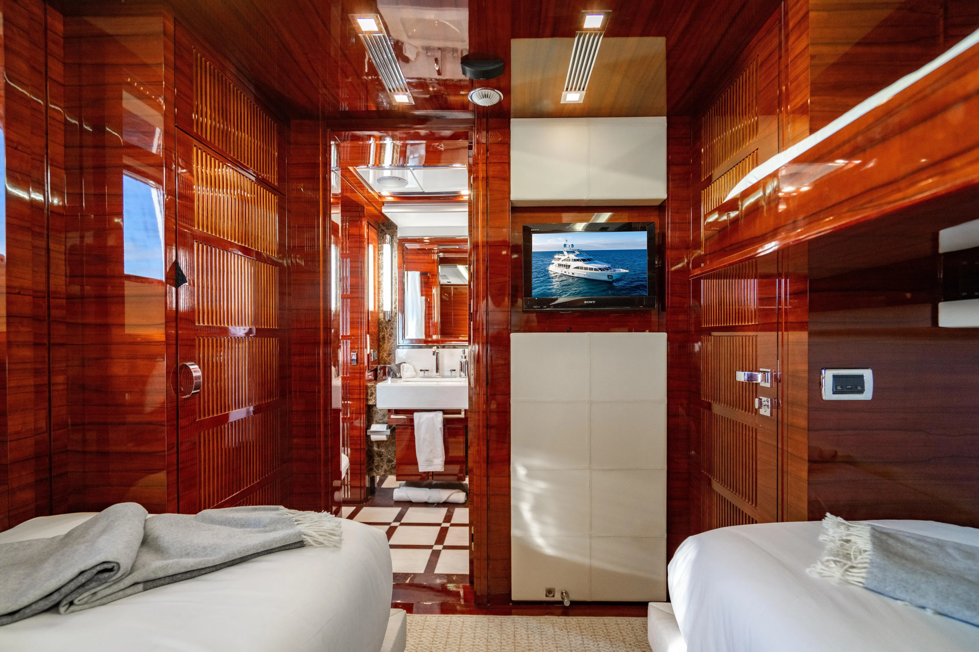 Allora Yacht Photos Pics Luxurious interior of 2011 Benetti Classic 121 yacht with polished wood and modern amenities.