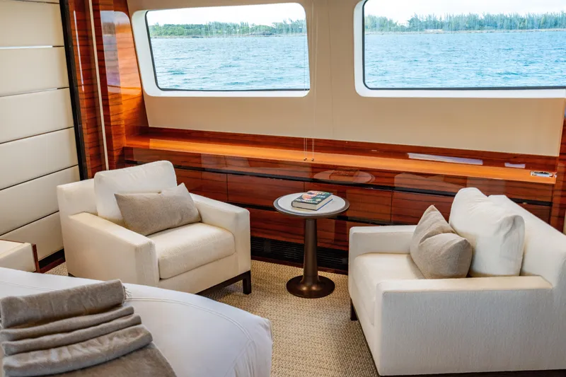 Allora Yacht Photos Pics Luxurious Benetti Classic 121 yacht interior with elegant seating and ocean view, 2011 model.