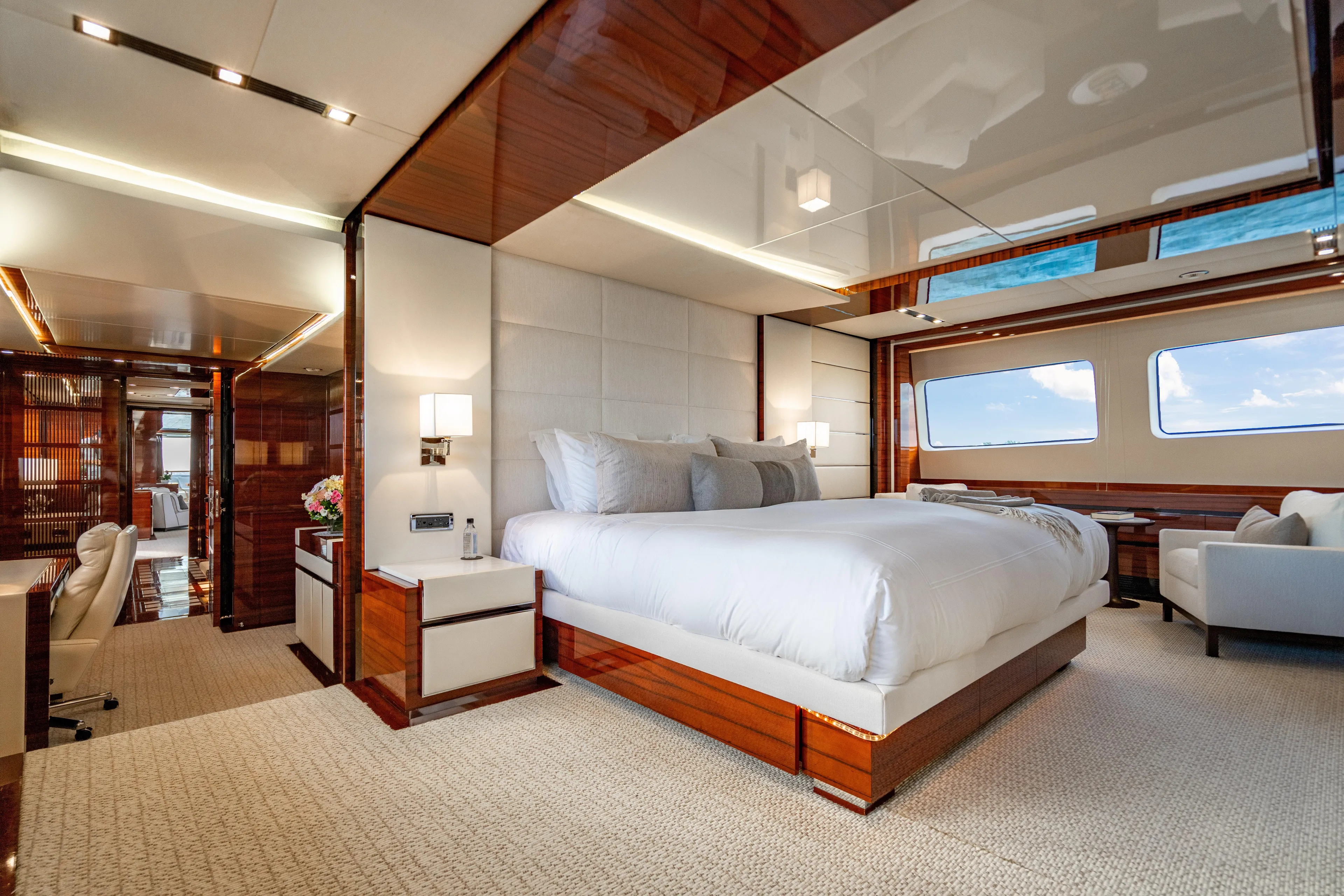Allora Yacht Photos Pics Luxurious interior of 2011 Benetti Classic 121 yacht with elegant bedroom and ocean view.