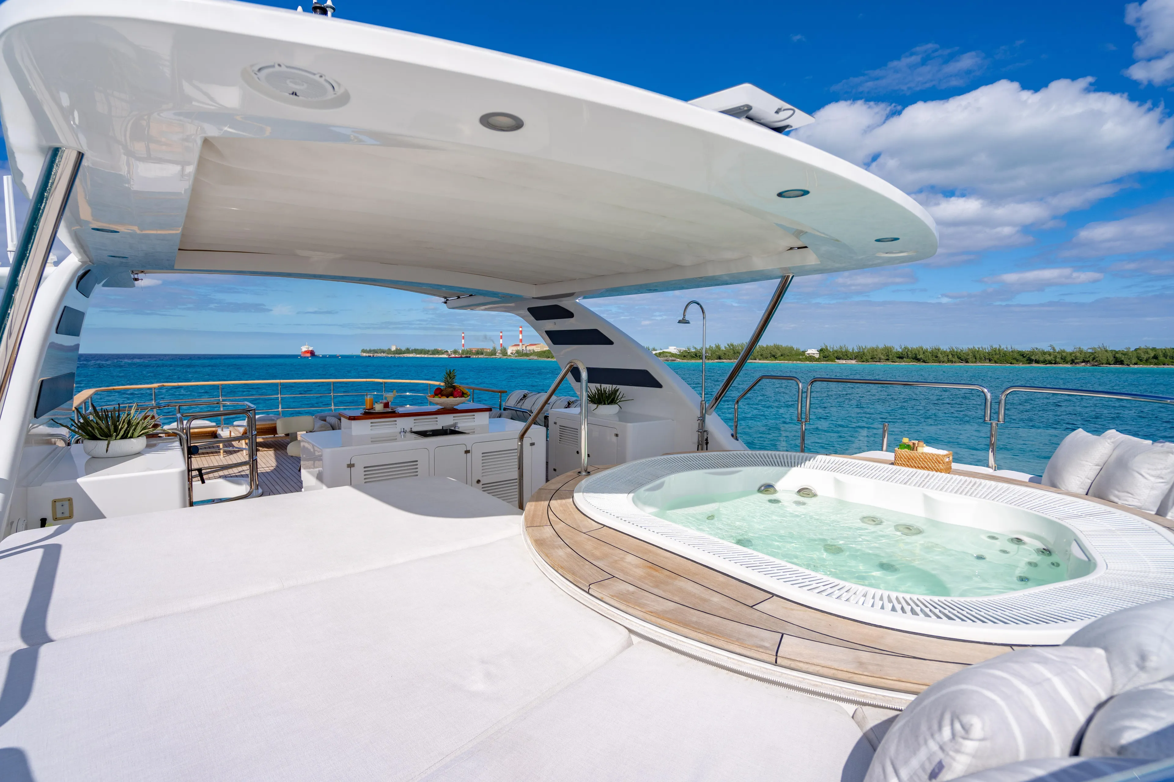 Allora Yacht Photos Pics Luxurious 2011 Benetti Classic 121 yacht deck with jacuzzi and ocean view.