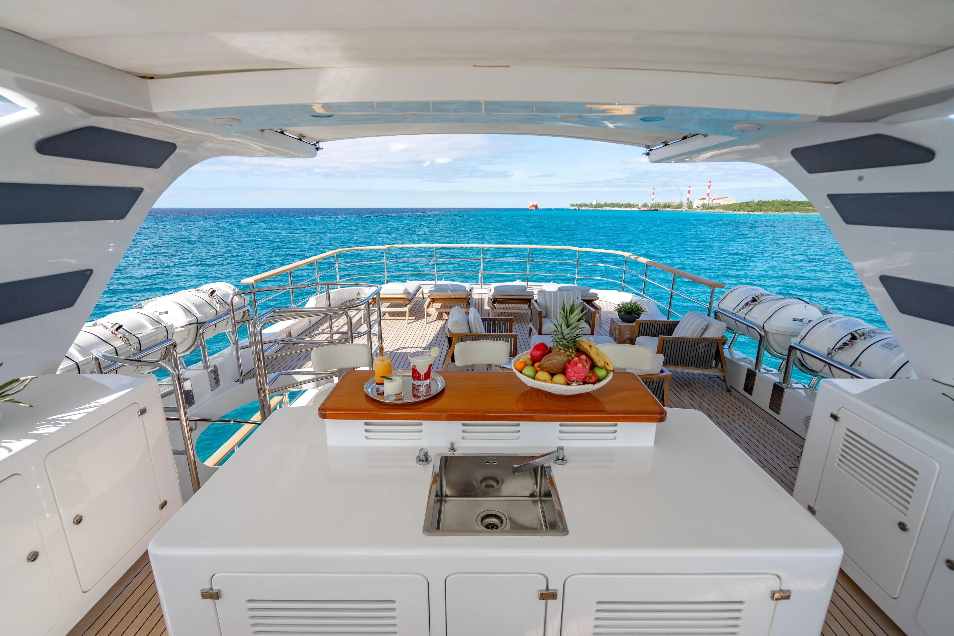 Allora Yacht Photos Pics Luxurious 2011 Benetti Classic 121 yacht deck with ocean view and elegant seating area.