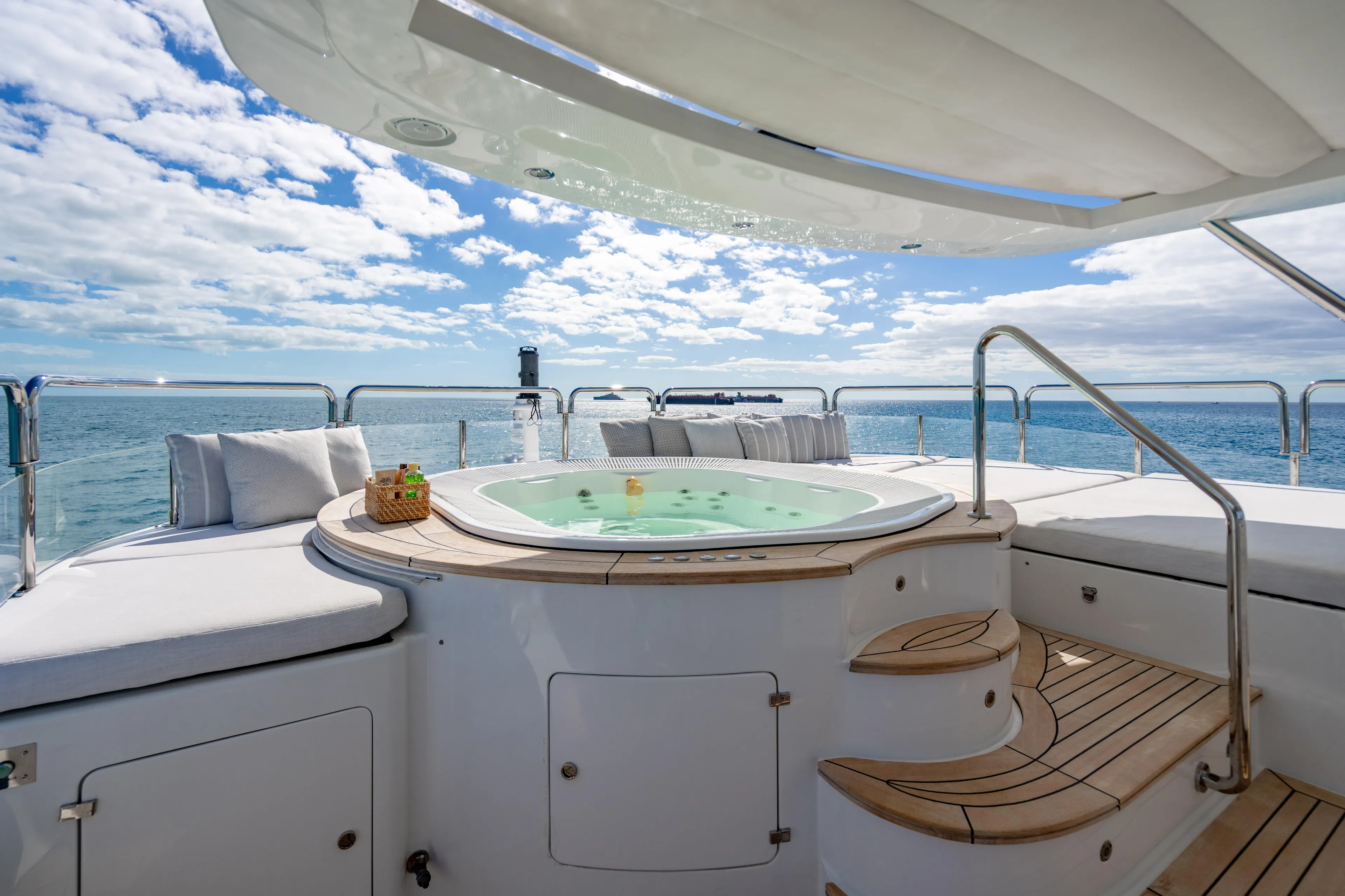 Allora Yacht Photos Pics Luxurious Benetti Classic 121 yacht deck with jacuzzi, ocean view, and comfortable seating, 2011 model.