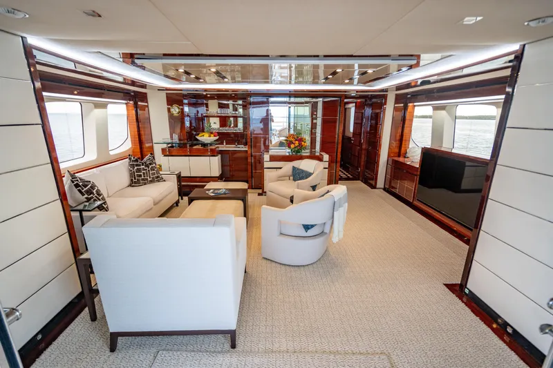 Allora Yacht Photos Pics Luxurious interior of a 2011 Benetti Classic 121 yacht with elegant seating and modern decor.