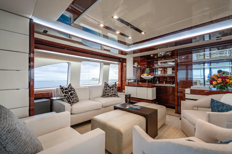 Allora Yacht Photos Pics Luxurious interior of 2011 Benetti Classic 121 yacht with elegant seating and ocean view.