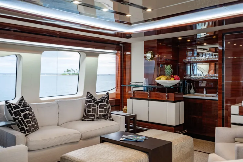 Allora Yacht Photos Pics Luxurious interior of 2011 Benetti Classic 121 yacht with elegant seating and fruit display.