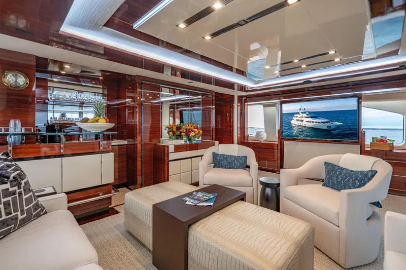 Allora Yacht Photos Pics Luxurious interior of 2011 Benetti Classic 121 yacht with elegant seating and ocean view.