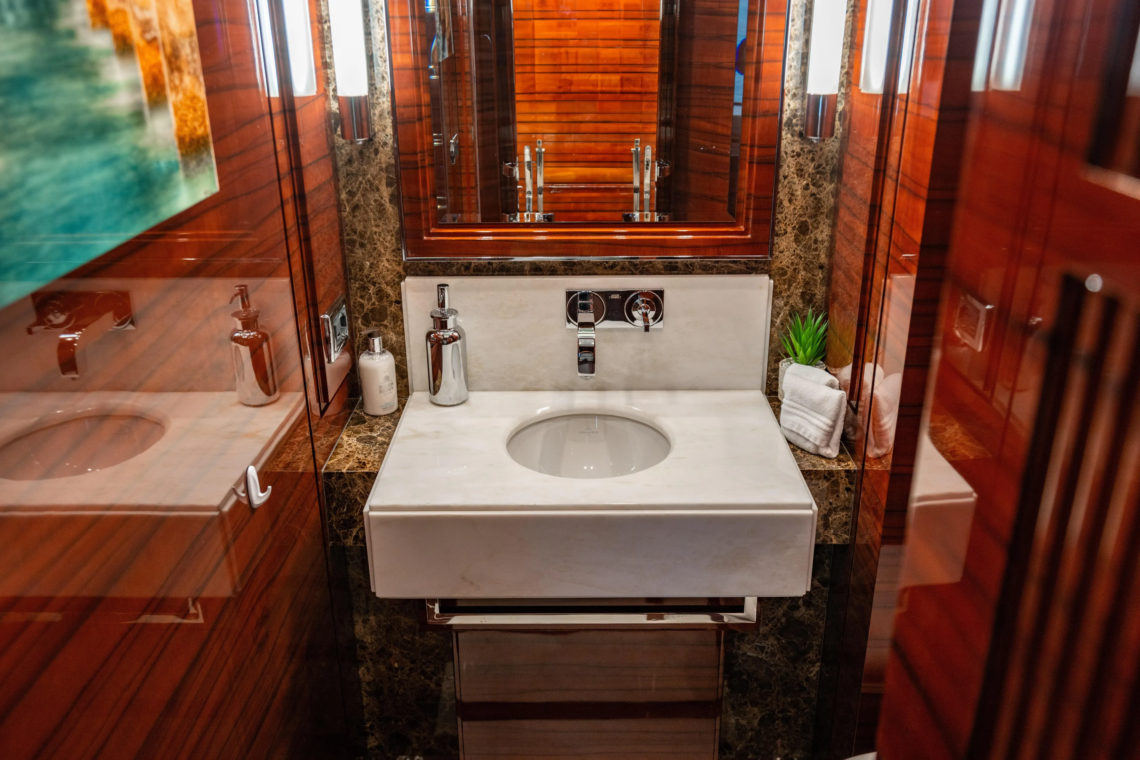 Allora Yacht Photos Pics Luxurious bathroom on 2011 Benetti Classic 121 yacht with elegant wood and marble finishes.