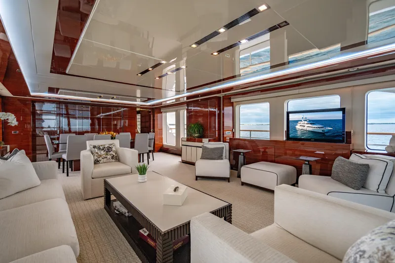 Allora Yacht Photos Pics Luxurious interior of 2011 Benetti Classic 121 yacht with elegant seating and ocean views.