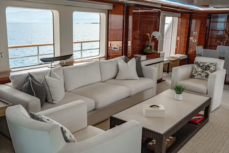 Allora Yacht Photos Pics Luxurious interior of 2011 Benetti Classic 121 yacht with elegant seating and ocean view.