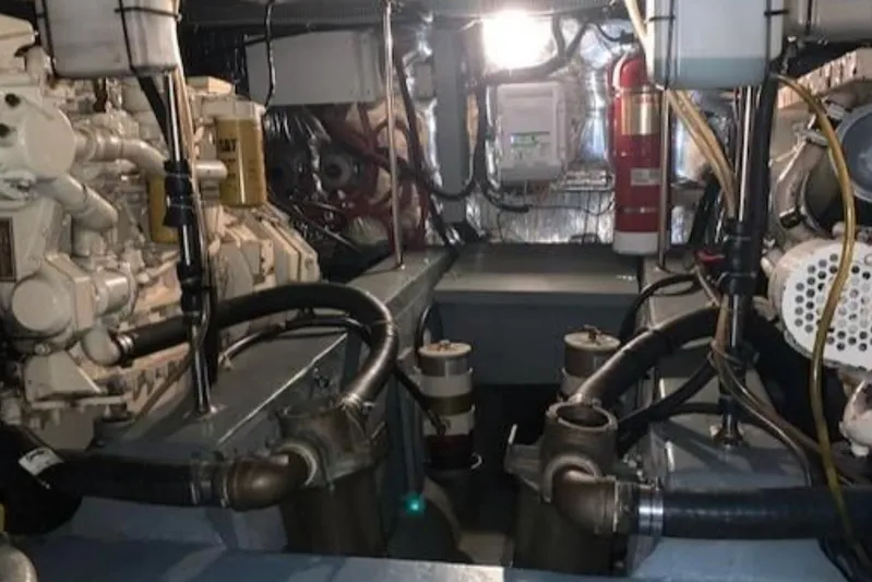  Yacht Photos Pics Engine room of 1994 Carver 440 Aft Cabin Motor Yacht with visible machinery and equipment.