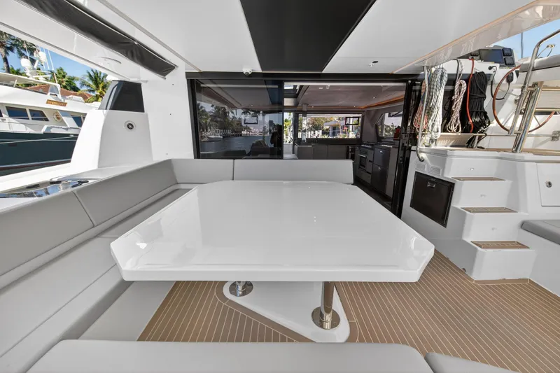  Yacht Photos Pics Luxurious 2021 Leopard 50 yacht interior with sleek seating and modern design.