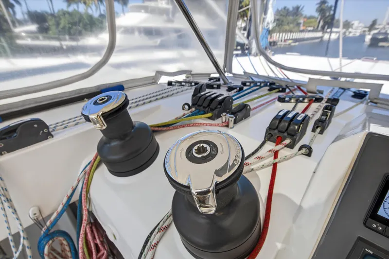  Yacht Photos Pics Control panel of a 2021 Leopard 50 yacht with winches and colorful ropes.