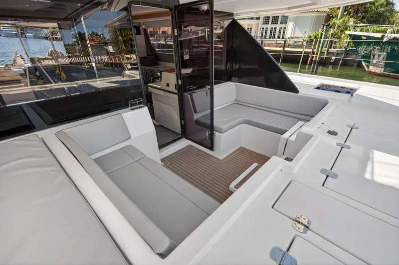  Yacht Photos Pics Luxurious 2021 Leopard 50 yacht interior with sleek seating and modern design.