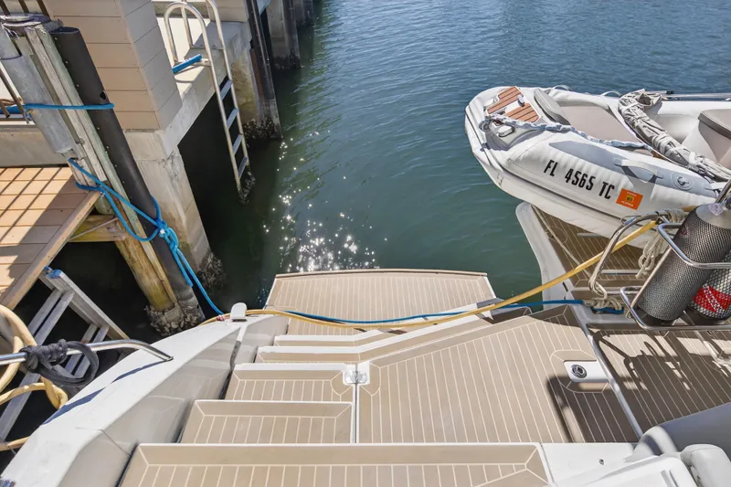  Yacht Photos Pics Luxury Leopard 50 yacht docked with inflatable boat, 2021 model.