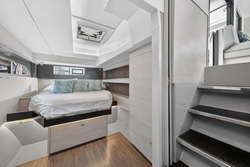  Yacht Photos Pics Luxurious 2021 Leopard 50 yacht interior with modern bedroom and sleek staircase design.