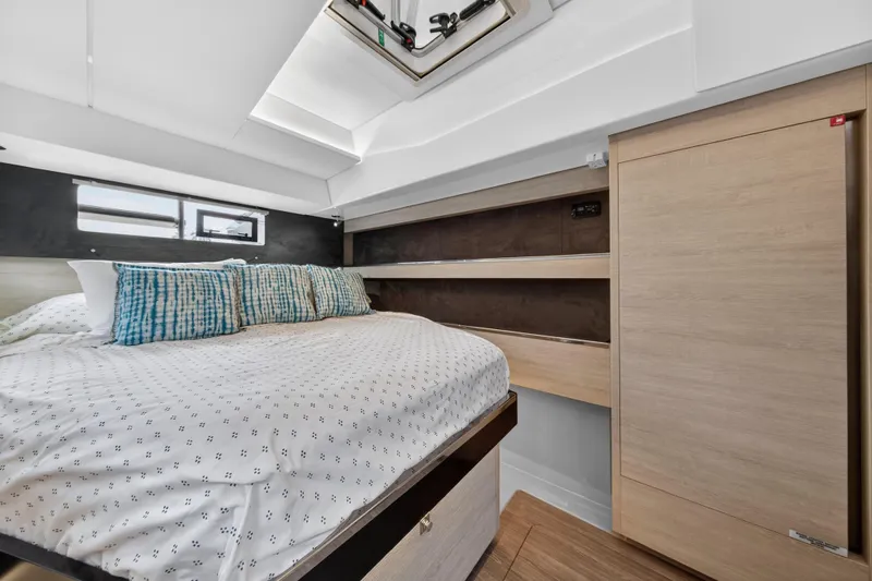  Yacht Photos Pics Modern bedroom interior in 2021 Leopard 50 yacht with skylight and stylish bedding.