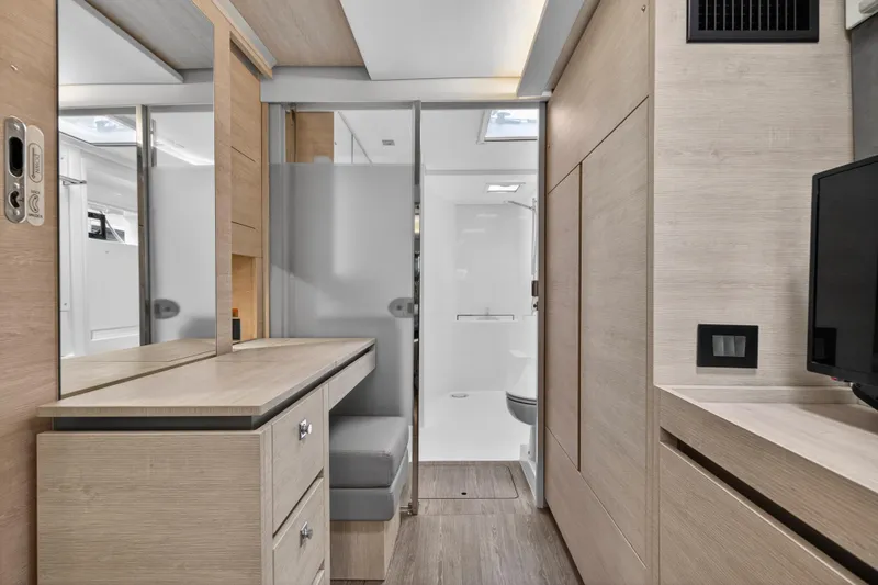  Yacht Photos Pics Modern interior of 2021 Leopard 50 yacht with sleek wood finishes and compact design.