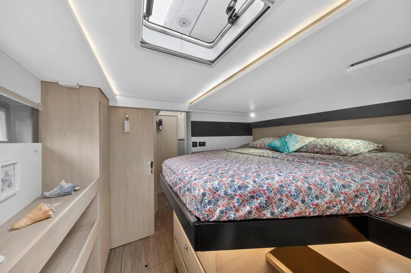 Yacht Photos Pics Luxurious interior of 2021 Leopard 50 yacht with cozy bedroom and modern design.