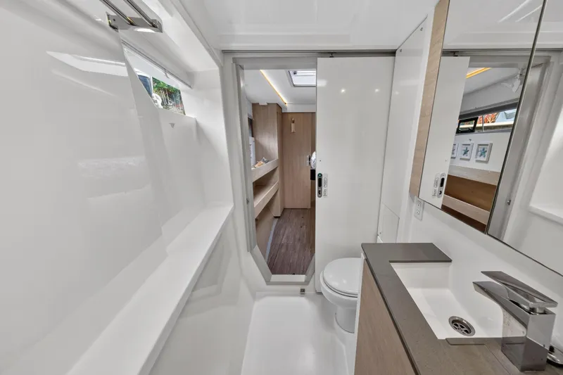  Yacht Photos Pics Modern bathroom interior on 2021 Leopard 50 yacht, featuring sleek design and fixtures.