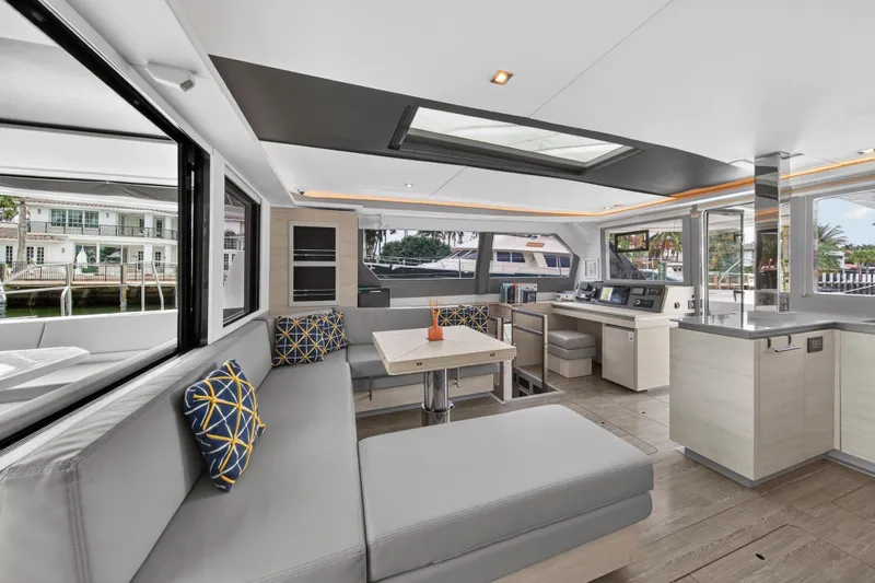  Yacht Photos Pics Luxurious interior of 2021 Leopard 50 yacht with modern seating and large windows.