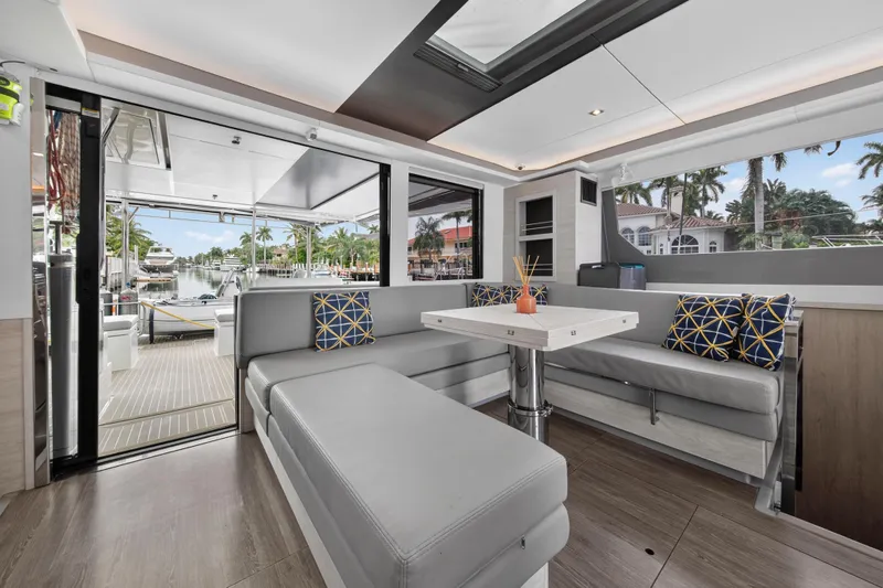  Yacht Photos Pics Luxurious interior of 2021 Leopard 50 yacht with modern seating and waterfront view.