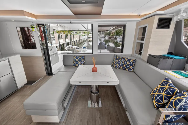  Yacht Photos Pics Luxurious Leopard 50 yacht interior with modern seating, geometric cushions, and elegant decor, 2021 model.