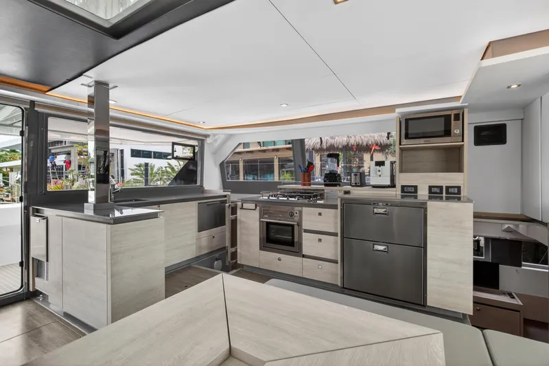  Yacht Photos Pics Modern kitchen interior on 2021 Leopard 50 yacht, featuring sleek appliances and stylish design.