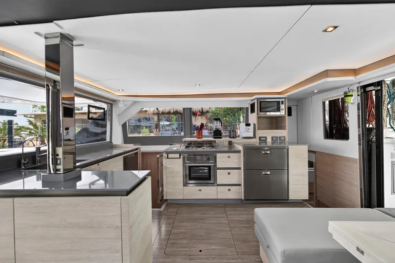  Yacht Photos Pics Modern kitchen interior on 2021 Leopard 50 yacht, featuring sleek design and appliances.