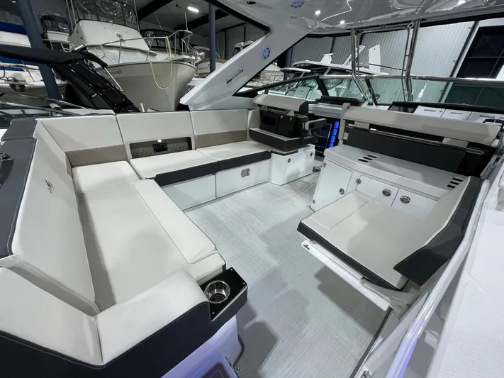Livin Life Yacht Photos Pics 2023 Monterey 378SS Super Sport boat interior with spacious seating and modern design.