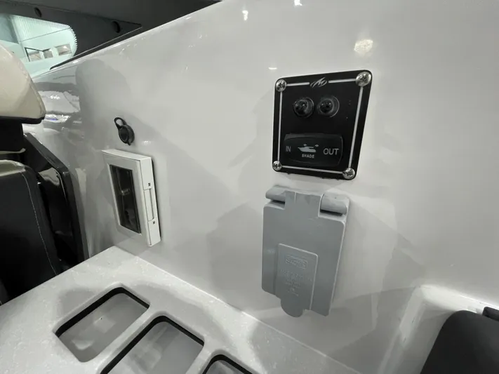 Livin Life Yacht Photos Pics 2023 Monterey 378SS Super Sport boat interior control panel and outlets.