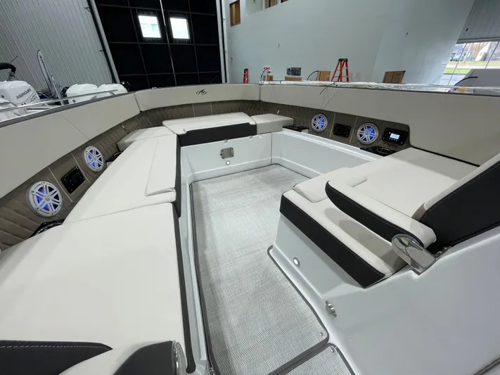 Livin Life Yacht Photos Pics 2023 Monterey 378SS Super Sport boat interior with spacious seating and modern audio system.