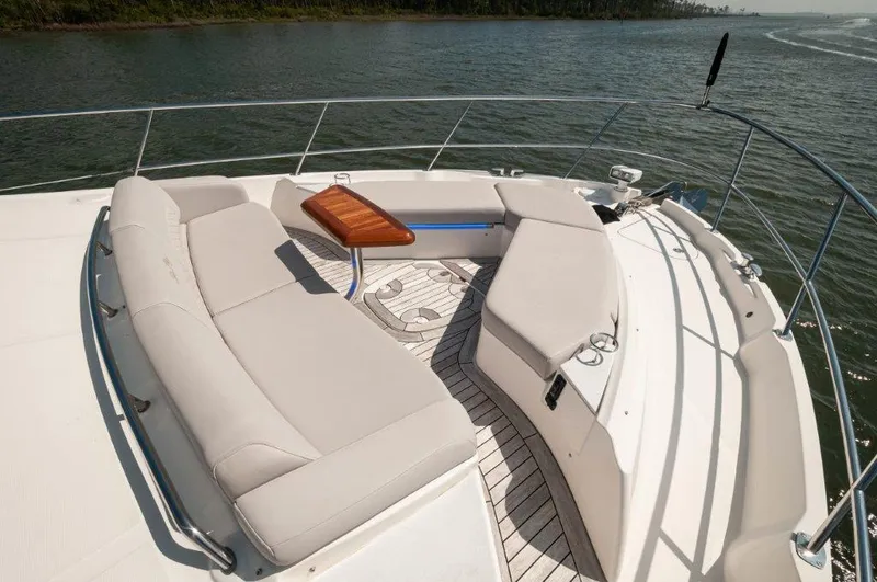 Lady Gail Yacht Photos Pics 2018 Sea Ray L550 Flybridge yacht with spacious deck seating and scenic water view.