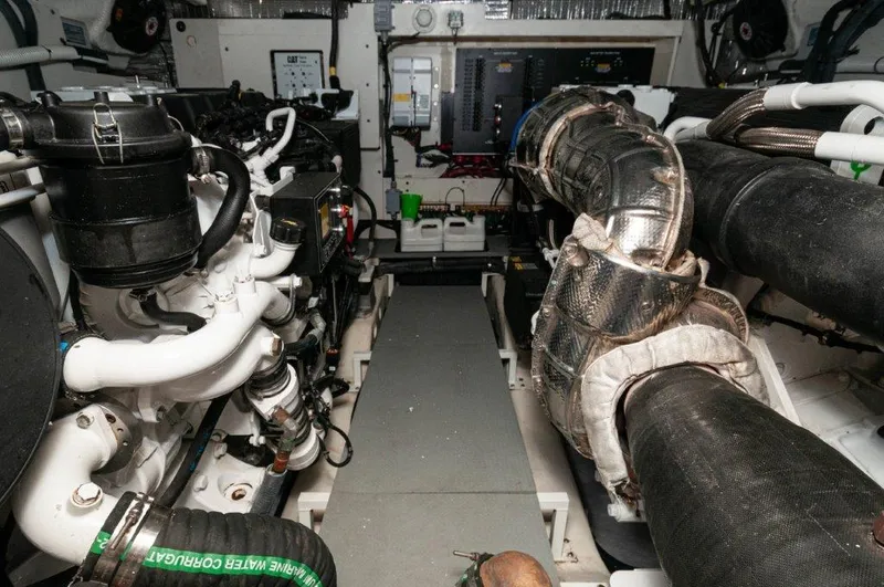 Lady Gail Yacht Photos Pics Engine room of 2018 Sea Ray L550 Flybridge yacht, showcasing mechanical components and systems.