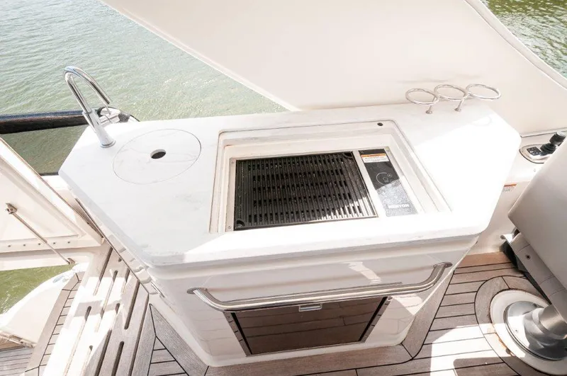 Lady Gail Yacht Photos Pics 2018 Sea Ray L550 Flybridge yacht with outdoor kitchen and grill on deck.