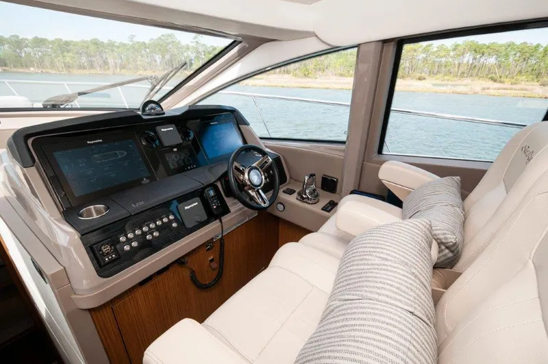 Lady Gail Yacht Photos Pics Luxurious 2018 Sea Ray L550 Flybridge helm with plush seating and advanced navigation systems.