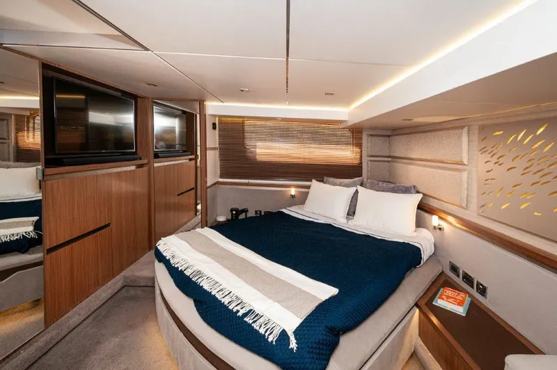 Lady Gail Yacht Photos Pics Luxurious bedroom interior of 2018 Sea Ray L550 Flybridge yacht with modern design.