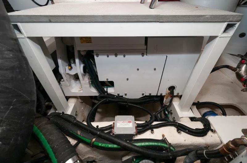 Lady Gail Yacht Photos Pics Engine room of 2018 Sea Ray L550 Flybridge with visible wiring and components.