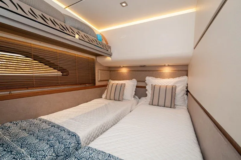 Lady Gail Yacht Photos Pics Luxurious twin cabin in 2018 Sea Ray L550 Flybridge yacht with modern decor.