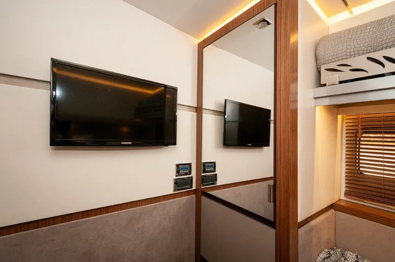 Lady Gail Yacht Photos Pics Luxurious interior of 2018 Sea Ray L550 Flybridge yacht with TV and modern decor.