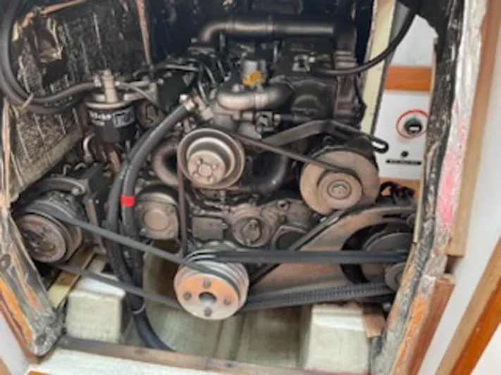 Condor Yacht Photos Pics Engine compartment of a 1996 J Boats J/160 sailboat, showcasing mechanical components.