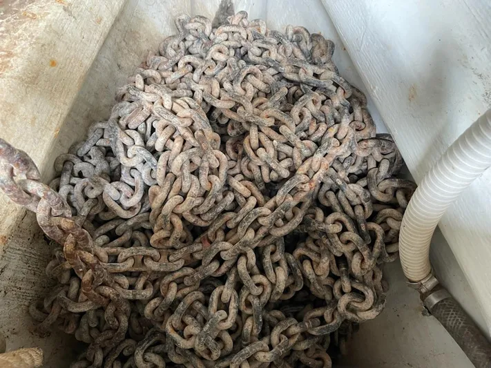 Condor Yacht Photos Pics Rusty anchor chain in a J Boats J/160 sailboat, 1996 model.