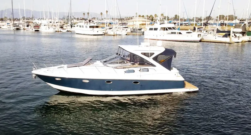 Syrenka Yacht Photos Pics 2008 Regal Commodore 4060 yacht docked in a marina, surrounded by other boats.