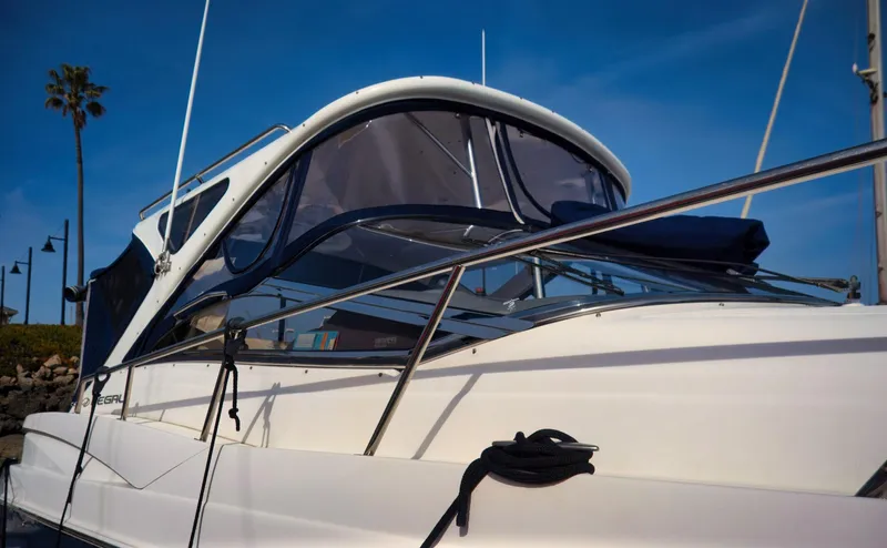 Syrenka Yacht Photos Pics 2008 Regal Commodore 4060 yacht docked under clear blue sky.