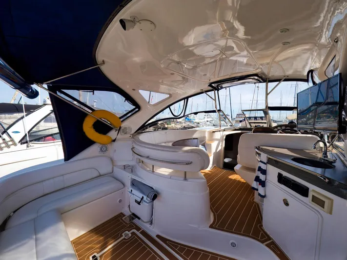 Syrenka Yacht Photos Pics Interior of 2008 Regal Commodore 4060 yacht with seating and modern amenities.