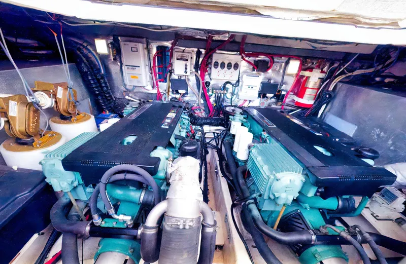 Syrenka Yacht Photos Pics Engine room of 2008 Regal Commodore 4060 with dual engines and complex wiring.
