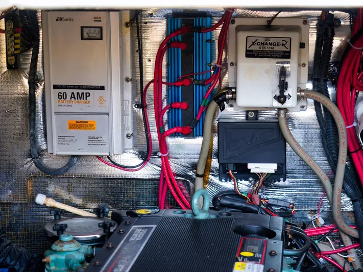 Syrenka Yacht Photos Pics Engine compartment of a 2008 Regal Commodore 4060 with battery charger and wiring.