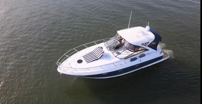 Syrenka Yacht Photos Pics 2008 Regal Commodore 4060 yacht cruising on calm waters.