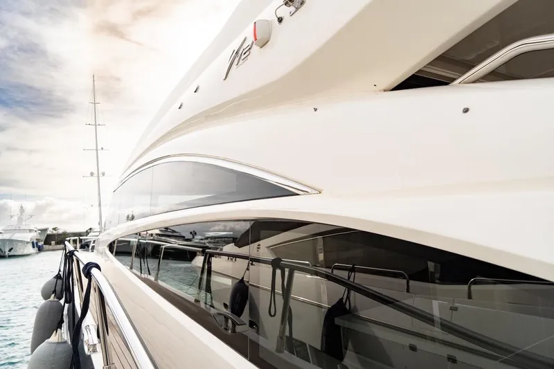  Yacht Photos Pics 2012 Princess V72 yacht docked, showcasing sleek design and modern architecture.