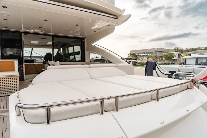  Yacht Photos Pics Luxurious 2012 Princess V72 yacht with spacious deck and elegant seating area.
