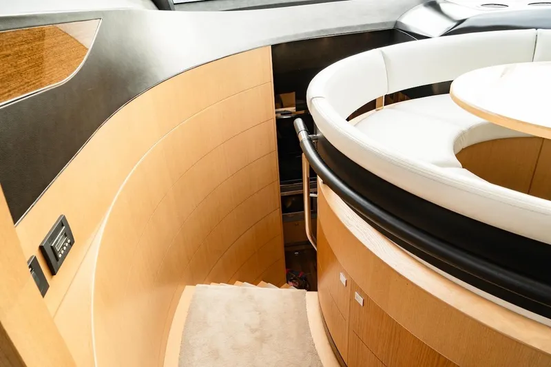  Yacht Photos Pics Luxurious interior of 2012 Princess V72 yacht with elegant wood and leather seating.